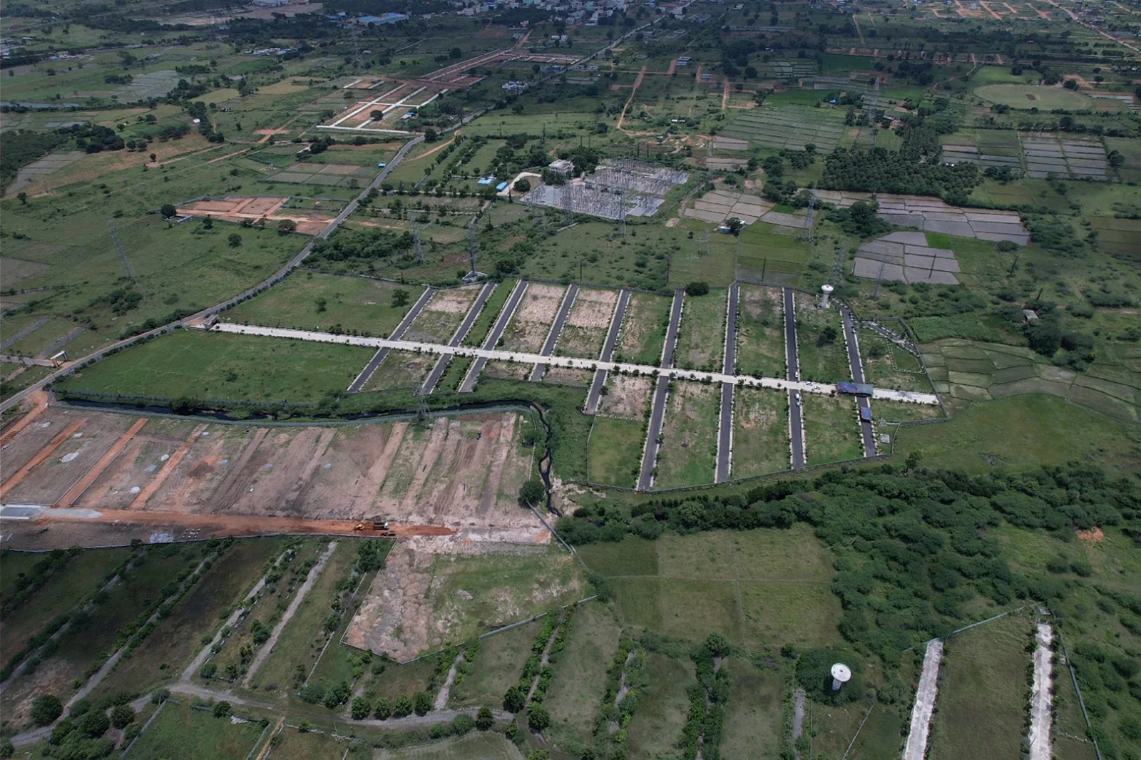 Aerial view of the Rainbow County plotted layout with internal roads at Shadnagar, Ranga Reddy District